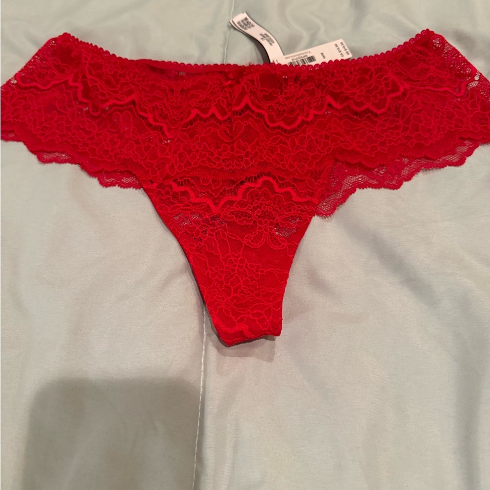 Victoria Secret red lace thong panties.